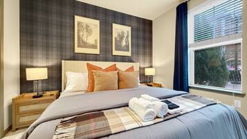 2 bedrooms, desk, iron/ironing board, travel crib