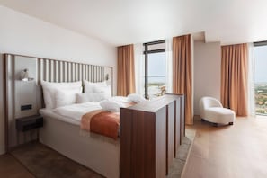 Ropa de cama de alta calidad, edredón, camas con pillow-top y minibar
