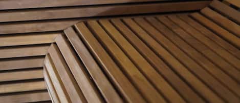 A wooden slatted wall design.