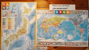 Two world maps with a sign asking "Where are you from?" and a table of Japanese flags. - Pension Snowfall Meteor (Kaminoyama)