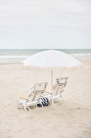 Sun loungers, beach towels. Top Floor Surfside Beach Condo with Pool & Easy Beach Access, Pets Welcome