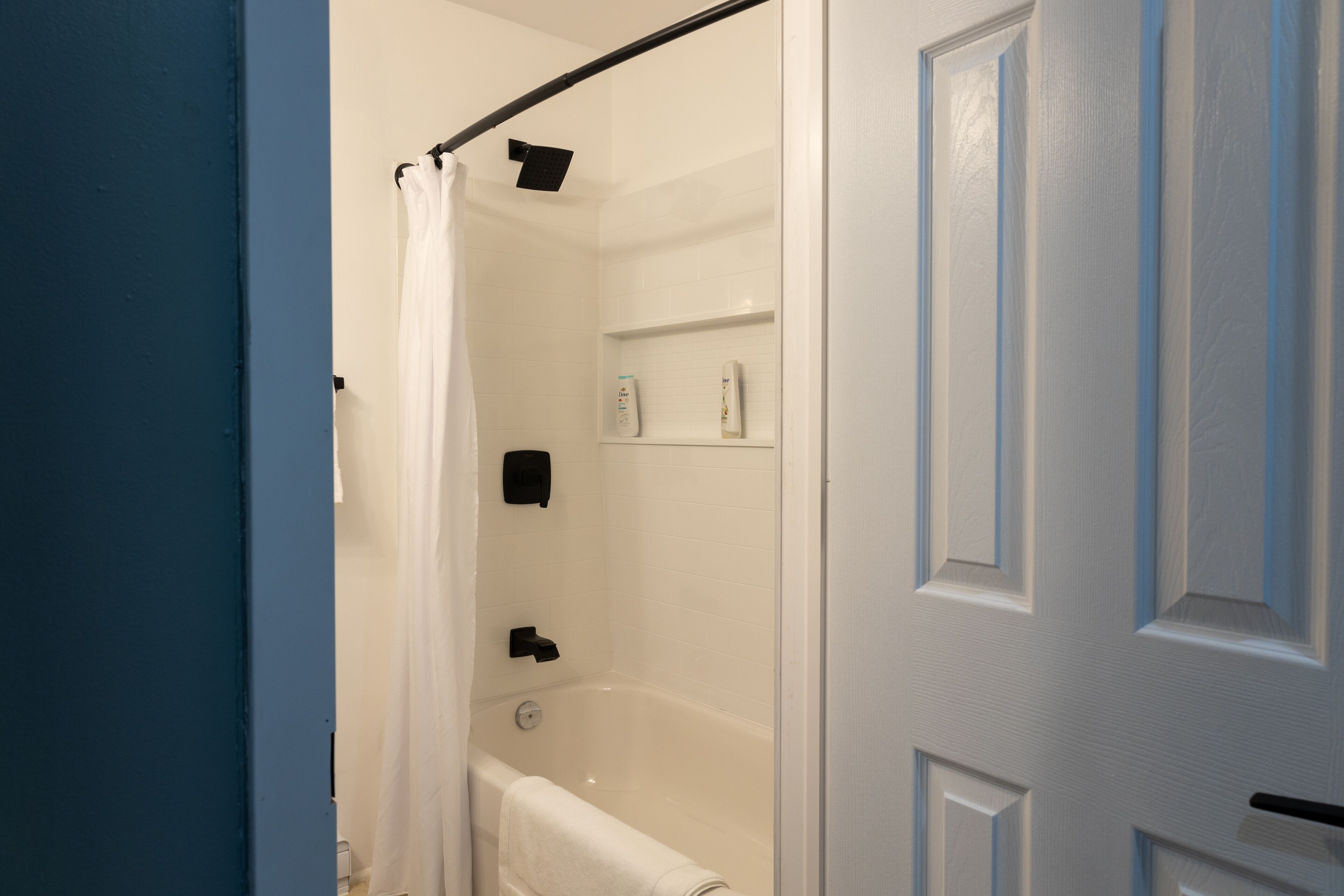 Hair dryer, towels, soap, shampoo