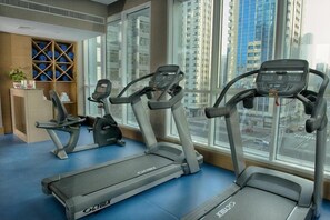 Stay fit with state-of-the-art equipment and city views.