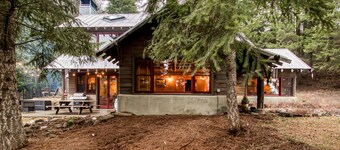 Rustic woodland home with hot tub, patios & fireplaces - near lake access