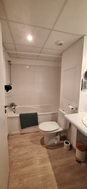 Hair dryer, towels, soap, shampoo