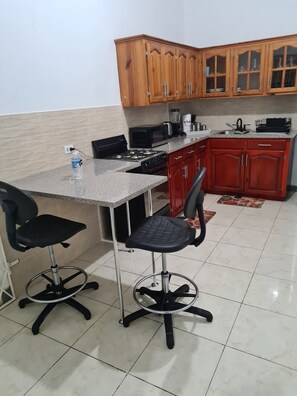 Fridge, microwave, oven, stovetop - Beautiful 2-Bed Apartment in Montego Bay (Montego Bay)