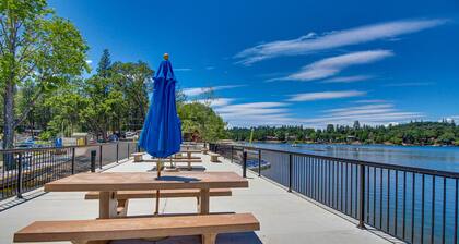 Water-view cabin near 3 beaches & marina with pool, fireplace, decks, & grill