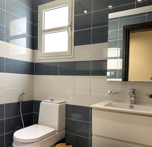 Design Apartment, 3 Bedrooms | Bathroom | Combined shower/bathtub, rainfall showerhead, hair dryer, bathrobes - Kease Qurtubah A-9 Royal Design AG97 (Riyadh)