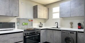 Design Apartment, 3 Bedrooms | Private kitchen | Espresso maker, coffee/tea maker, electric kettle, dining tables - Kease Qurtubah A-11 Royal Design AG78 (Riyadh)