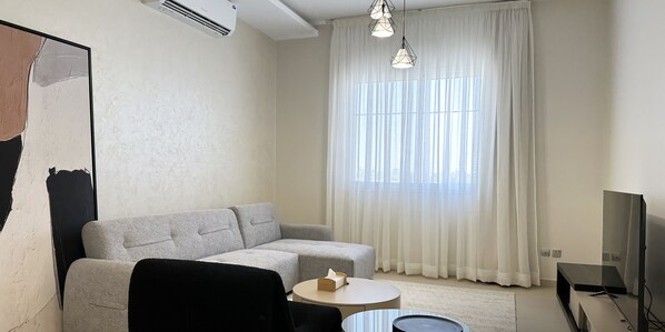 Design Apartment, 3 Bedrooms | Living area | Flat-screen TV - Kease Qurtubah A-13 Royal Design AZ38 (Riyadh)
