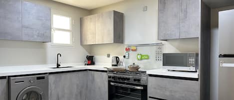Design Apartment, 2 Bedrooms | Private kitchen | Electric kettle