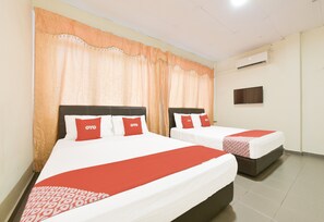 A hotel room with two beds, each with a white bedspread and red accents, a large window with curtains, and a flat-screen TV mounted on the wall. - Hotel O Gest Inn (Kota Tinggi)