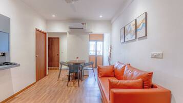 Suite | Living area | 42-inch LCD TV with satellite channels