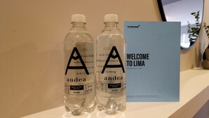 Two bottles of water labeled 'andea' and a welcome sign for Lima. - w * | Elegant 1BR in San Isidro (San Isidro)