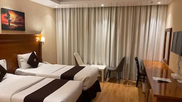 Deluxe Room | 1 bedroom, pillowtop beds, in-room safe, desk