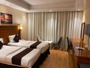 Deluxe Room | 1 bedroom, pillow-top beds, in-room safe, desk - Raha Grand Hotel  (Dubai)