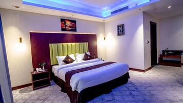 Habitación ejecutiva | 1 habitación, camas con pillow-top y caja de seguridad en la habitación