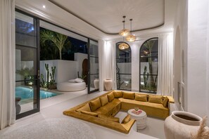 Deluxe Villa, Pool View | Living area | Flat-screen TV - Villa Golden (Canggu)