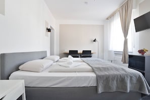 Wi-Fi de cortesia, roupa de cama