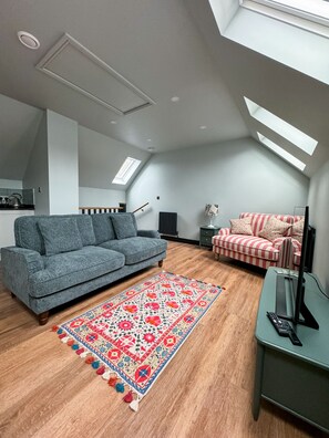 Superior Cottage, 2 Bedrooms | Living area | 32-inch Smart TV with digital channels