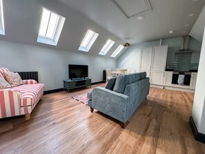 Superior Cottage, 2 Bedrooms | Living area | 32-inch Smart TV with digital channels