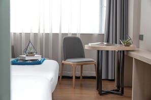Desk, blackout curtains, soundproofing, free WiFi