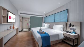 Desk, blackout curtains, soundproofing, free WiFi