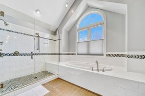 Shower, hair dryer, towels, shampoo