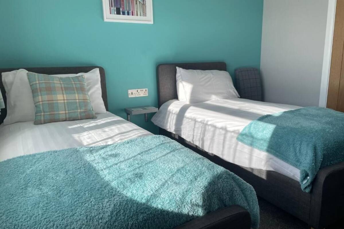 Memory-foam beds, blackout curtains, iron/ironing board (on request)