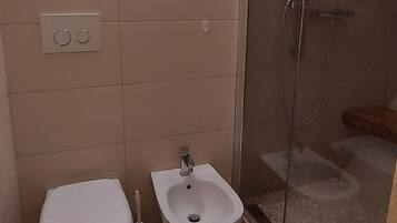 Hair dryer, bidet, towels, soap