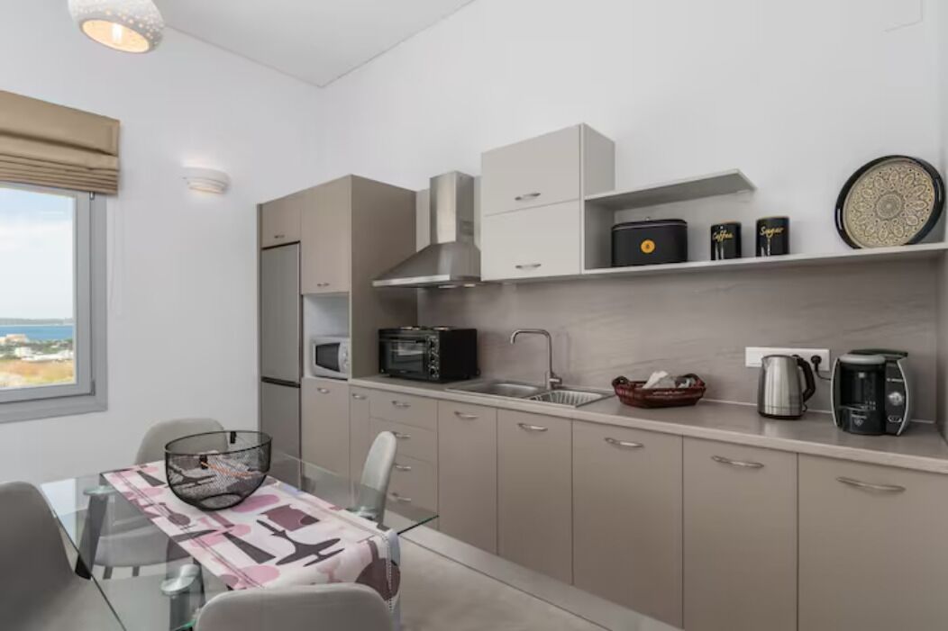 Exclusive Apartment, Garden Area | Private kitchen | Espresso maker, coffee/tea maker, electric kettle, toaster