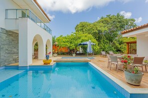 Outdoor pool, pool umbrellas, pool loungers