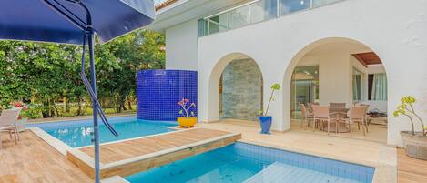 Outdoor pool, pool umbrellas, pool loungers