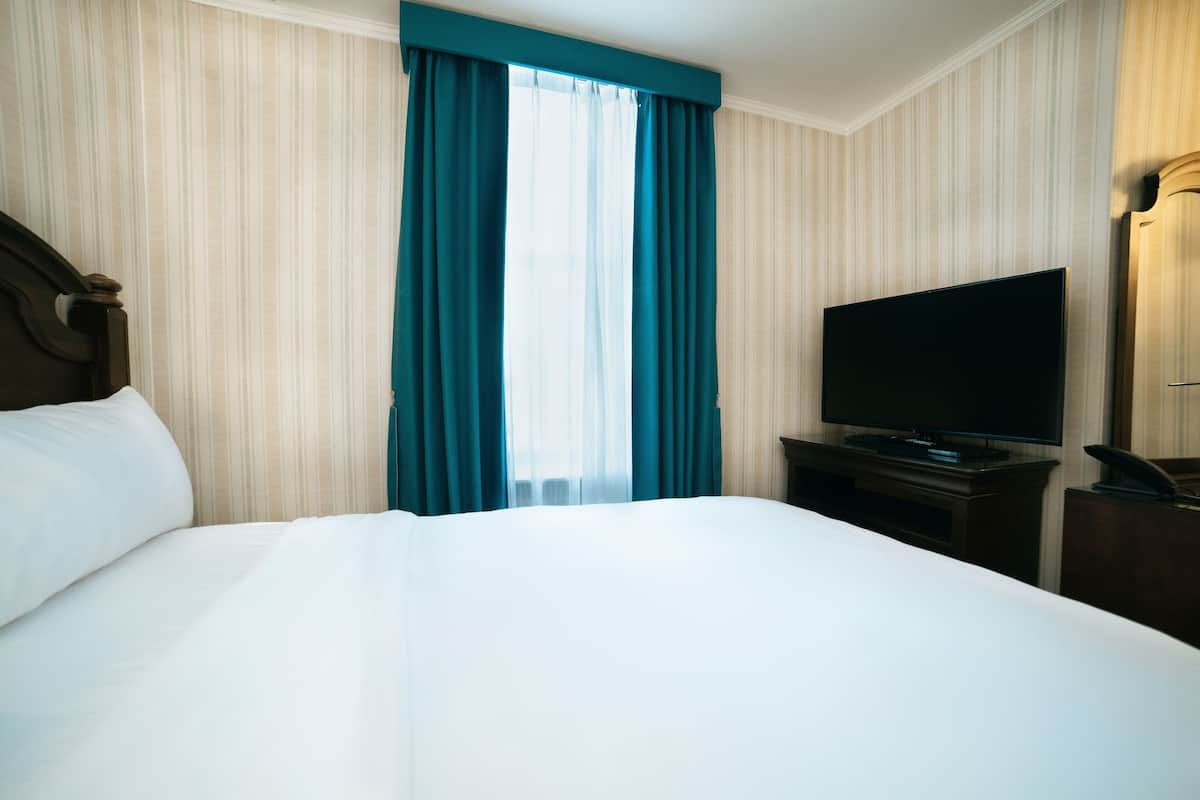 1 Full Bed | 1 bedroom, in-room safe, individually decorated, desk