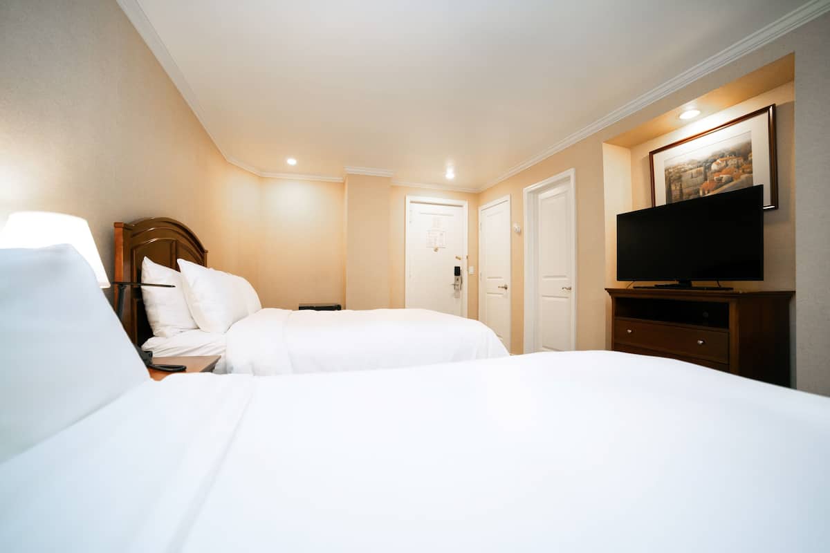 High Floor, 2 Full Beds | 1 bedroom, in-room safe, individually decorated, desk