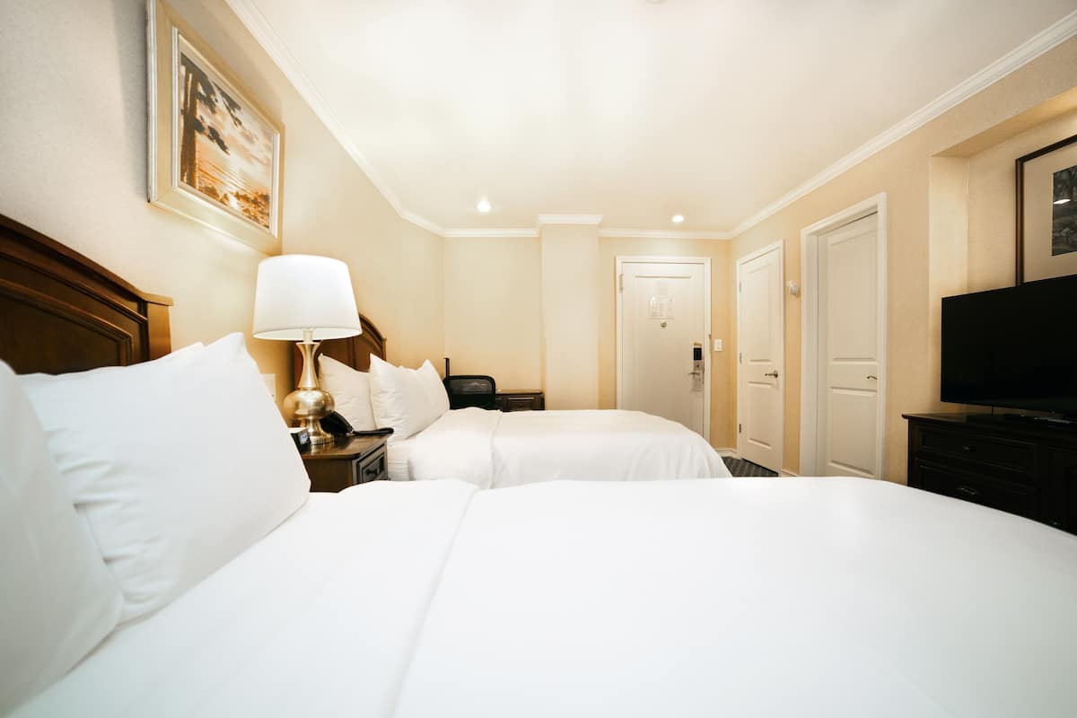 2 Full Beds | 1 bedroom, in-room safe, individually decorated, desk