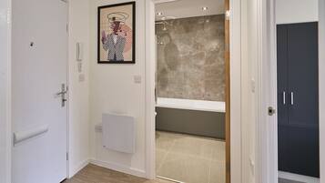 Shower, towels, soap, toilet paper