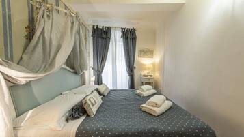 Romantic Apartment | Premium bedding, down comforters, individually decorated