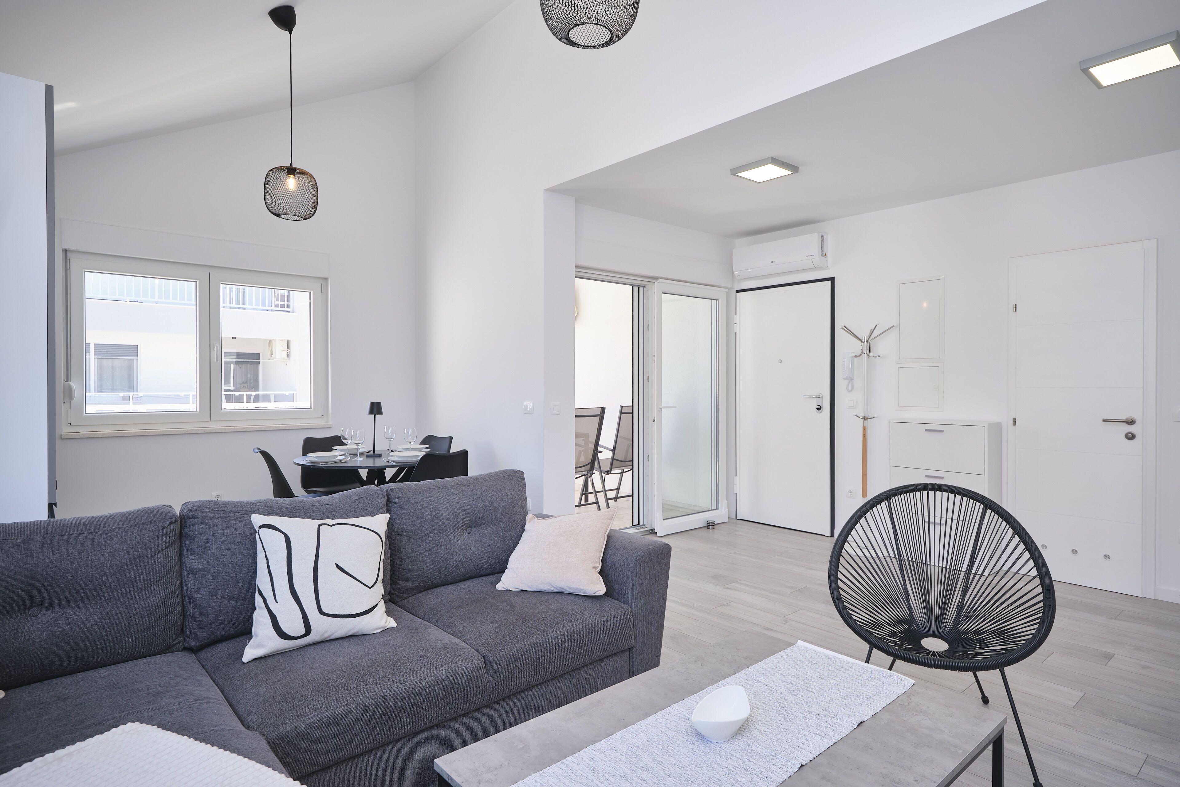 Apartment, Balcony, Bay View | Living area | 60-inch Smart TV with cable channels