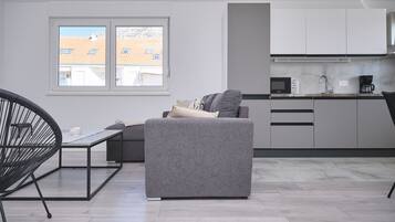 Appartement, balcon, vue baie | Coin séjour