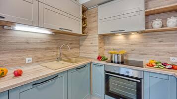 Family Apartment, Multiple Bedrooms (West Oasis With Terrace) | Private kitchen | Fridge, microwave, oven, stovetop