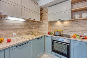 Family Apartment, Multiple Bedrooms (West Oasis With Terrace) | Private kitchen | Fridge, microwave, oven, stovetop - West Oasis With Terrace (Zagreb)