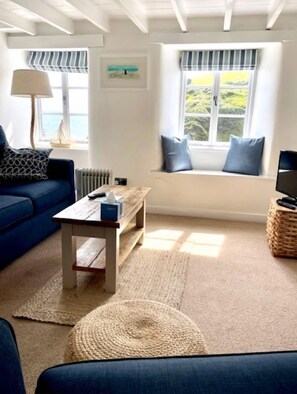 Deluxe Cottage, 1 Bedroom, Sea View | Living area | Flat-screen TV