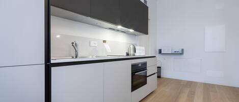 Apartment (1 Bedroom) | Private kitchen | Fridge, microwave, oven, stovetop