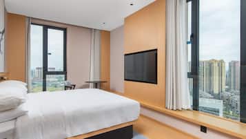 Business Suite, 1 King Bed | 1 bedroom, down comforters, in-room safe, desk