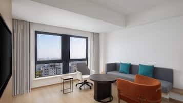 Suite, 1 King Bed, City View | Living area | 42-inch LCD TV with digital channels