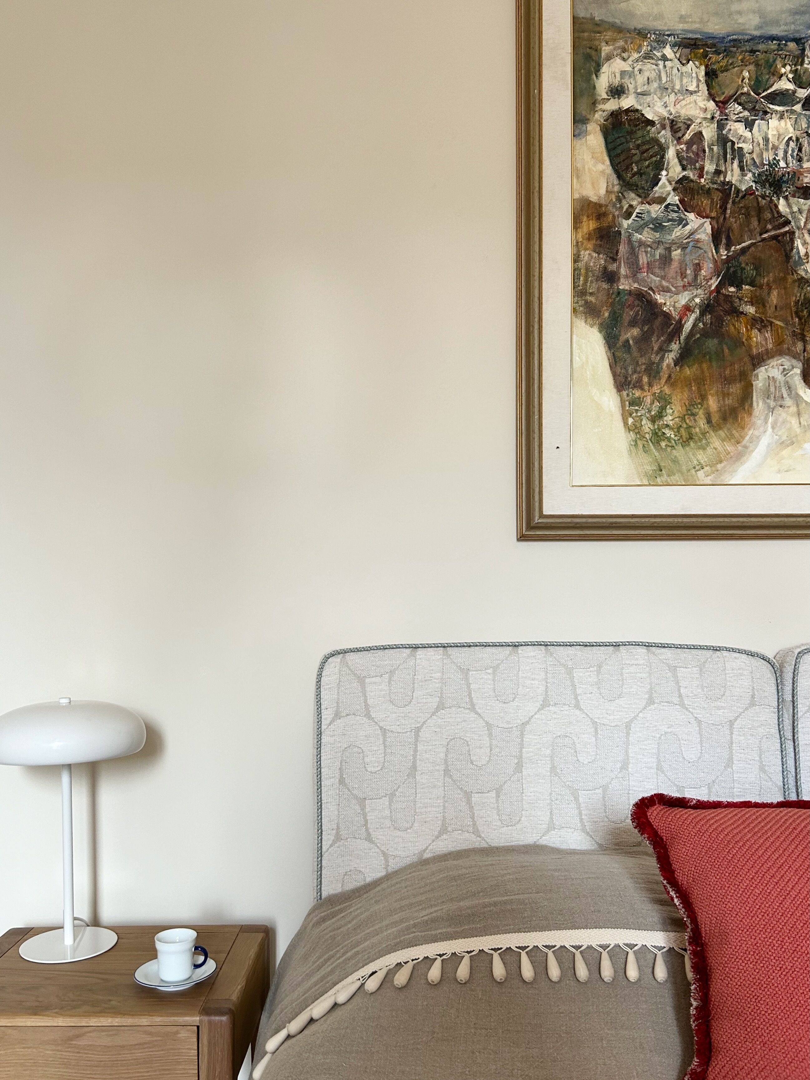 Sumptuous textures and local artwork create a cozy feel in Bedroom 1
