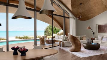 Royal Villa, 3 Bedrooms, Private Pool, Sea View | Living room | 55-inch LED TV with satellite channels, books
