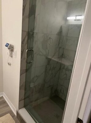Shower, eco-friendly toiletries, hair dryer, towels