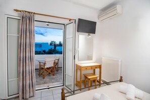 Apartment, 2 Bedrooms, Balcony | Living room | Books - Three Bedroom Apartment First Floor (Paros)